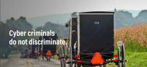 Amish buggies traveling on a rural road with text saying, "Cyber criminals do not discriminate"